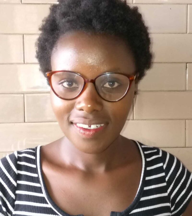 Image of the author Mary Wanjiru Njuki smiling.